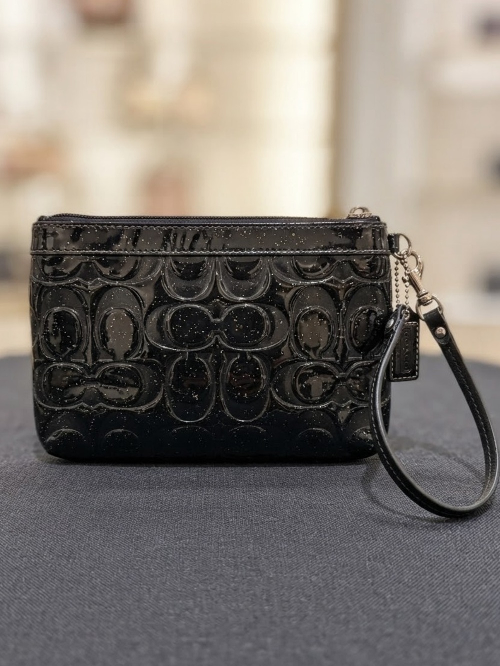 COACH- Speckled Black Patent Signature Wristlet